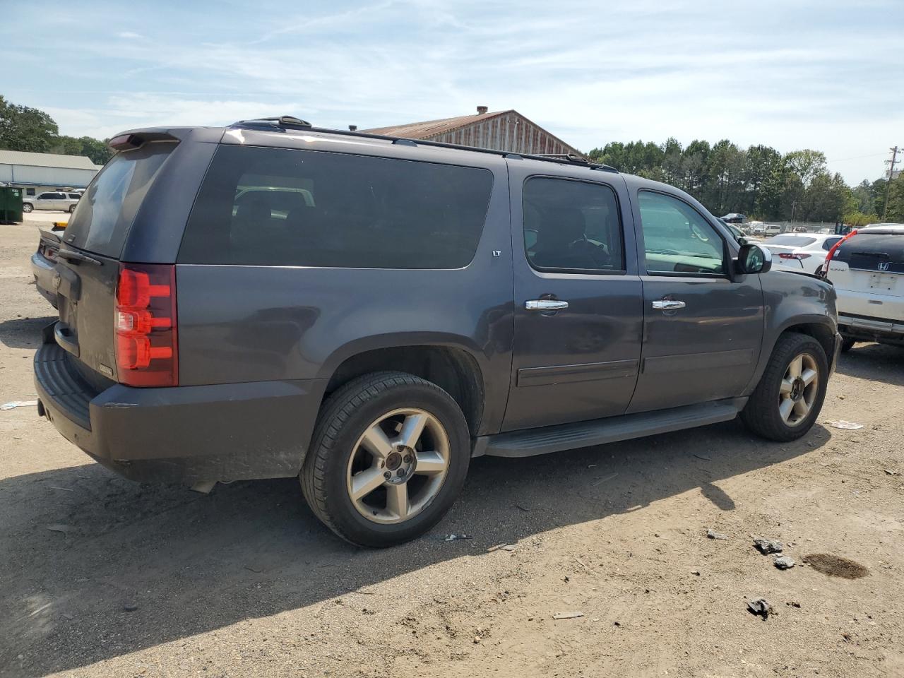 2010 Chevrolet Suburban VIN 1GNUCJE08AR282271 Copart auction photo, all over damage thumbnail 3