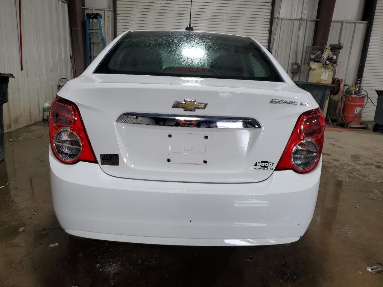 2015 Chevrolet Sonic VIN 1G1JC5SH3F4112796 Copart auction photo, side / front end damage thumbnail 6
