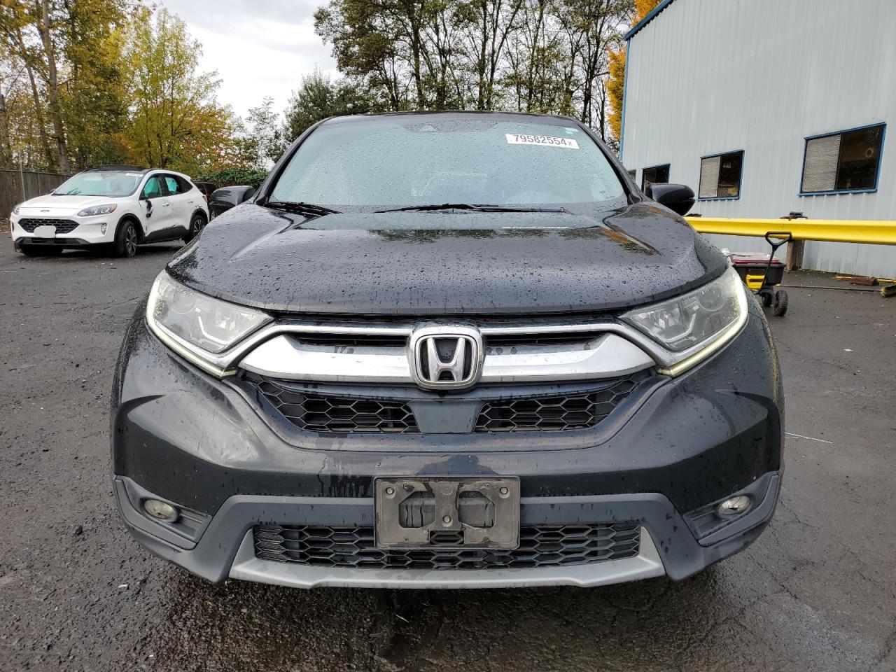 2018 Honda CR-V VIN 7FARW2H57JE058714 Copart auction photo, side / front end damage thumbnail 5