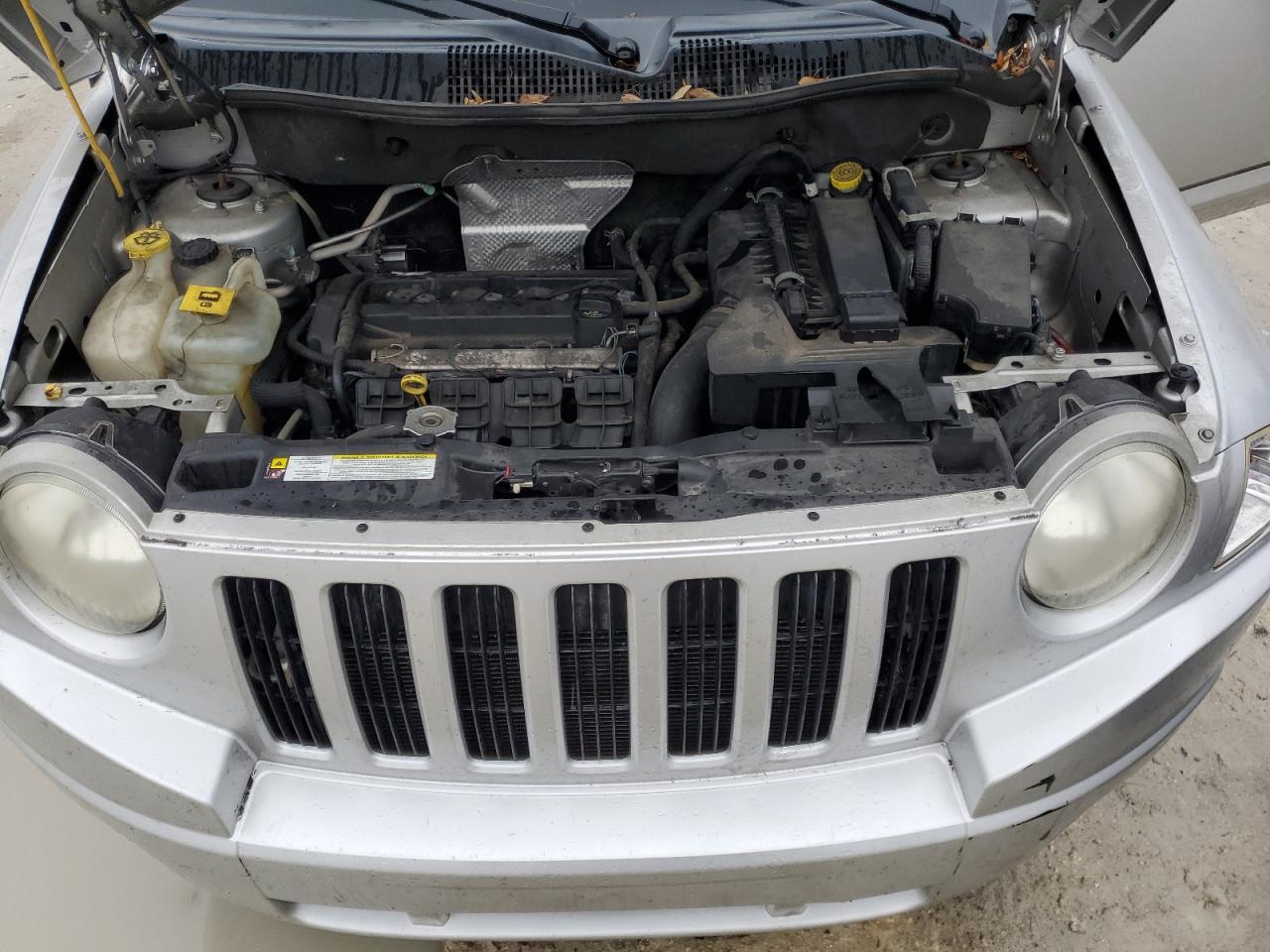 2010 Jeep Compass VIN 1J4NT1FA5AD676600 Copart auction photo, minor dent/scratches damage thumbnail 12