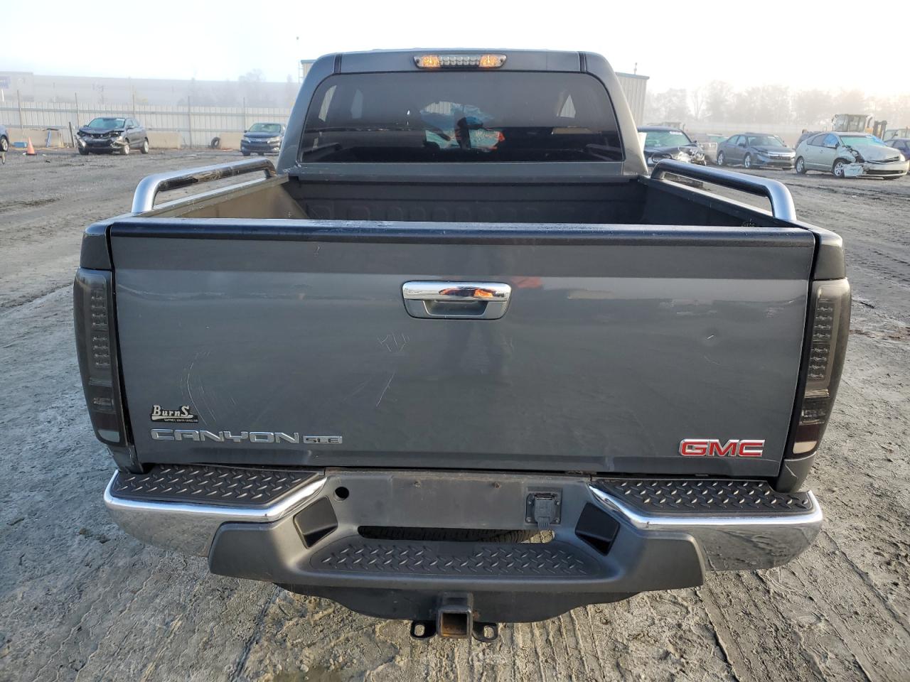 2012 GMC Canyon VIN 1GTH5MFE2C8132732 Copart auction photo, top/roof damage thumbnail 6