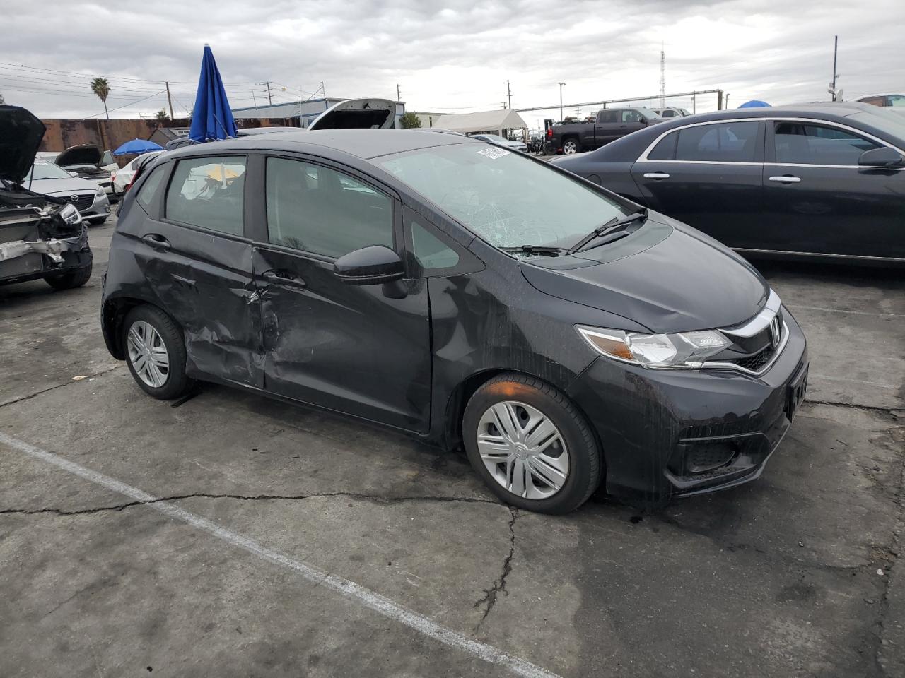 2019 Honda Fit VIN 3HGGK5H43KM729303 Copart auction photo, rear end / all over damage thumbnail 4