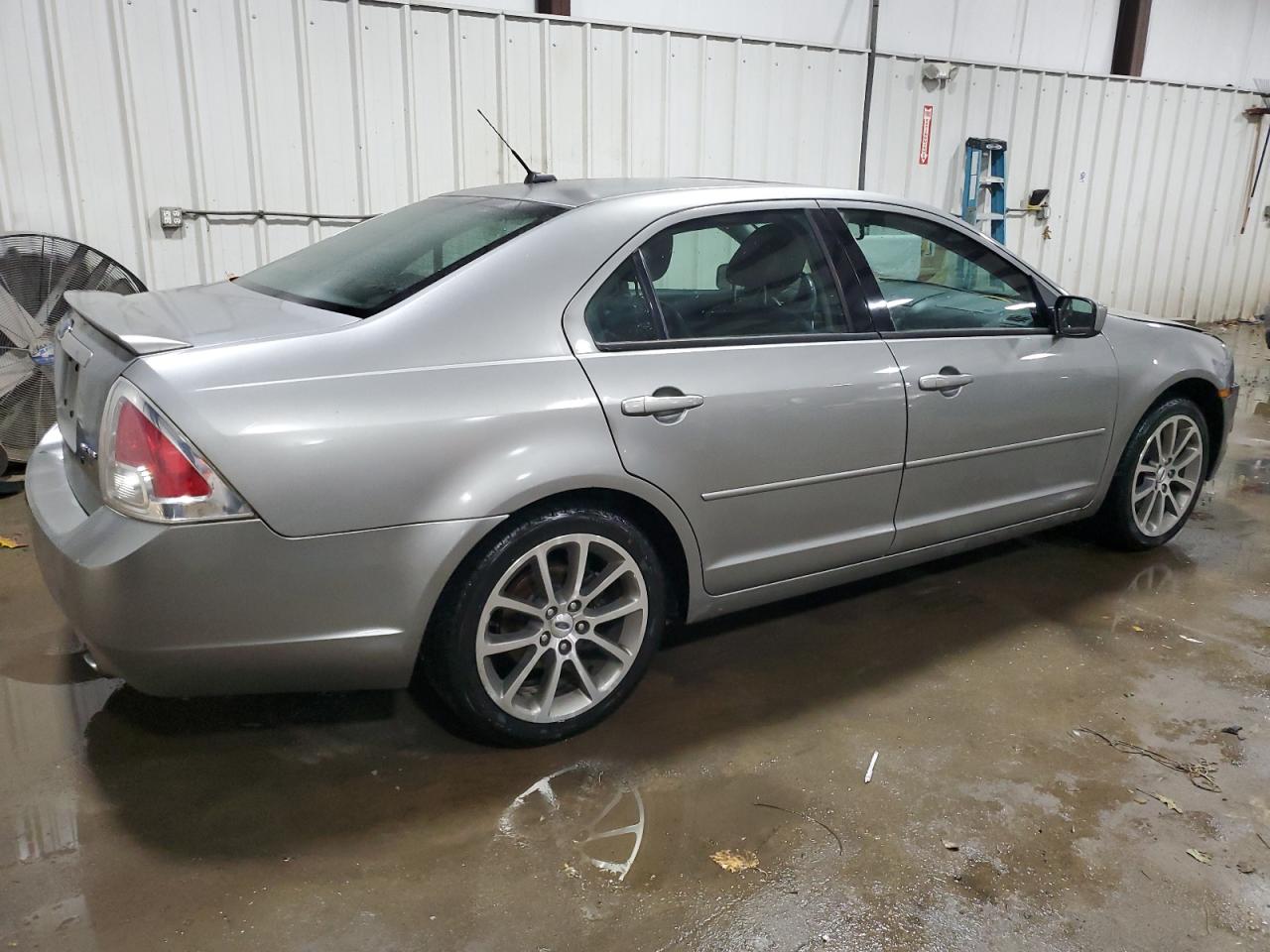2009 Ford Fusion VIN 3FAHP07189R181221 Copart auction photo, front end / rear end damage thumbnail 3