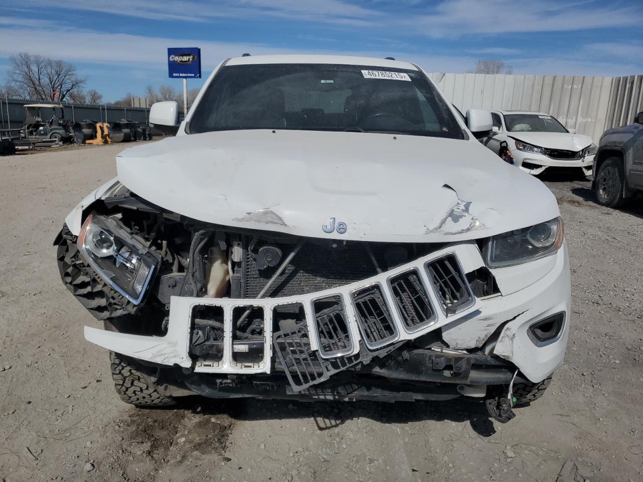 2014 Jeep Grand Cherokee VIN 1C4RJFBG7EC399495 Copart auction photo, front end / side damage thumbnail 5