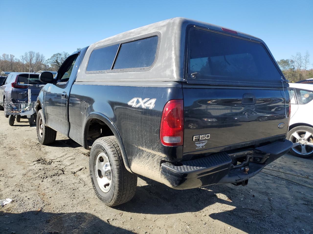 2002 Ford F-150 VIN 1FTRF18232NA58109 Copart auction photo, rear end / minor dent/scratches damage thumbnail 2
