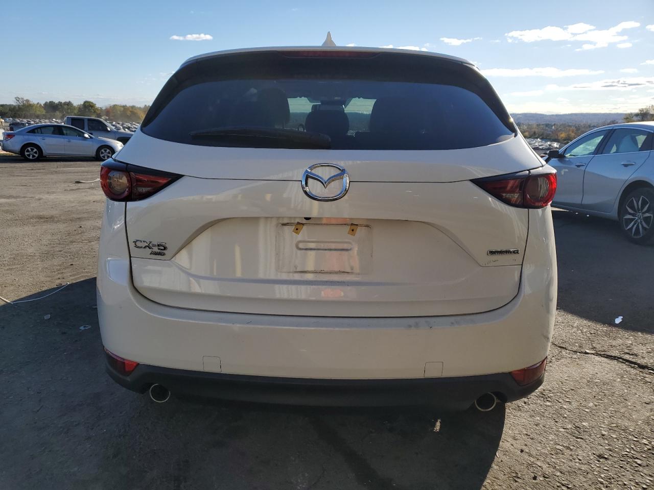 2021 Mazda CX-5 VIN JM3KFBDM6M1379206 Copart auction photo, side / front end damage thumbnail 6