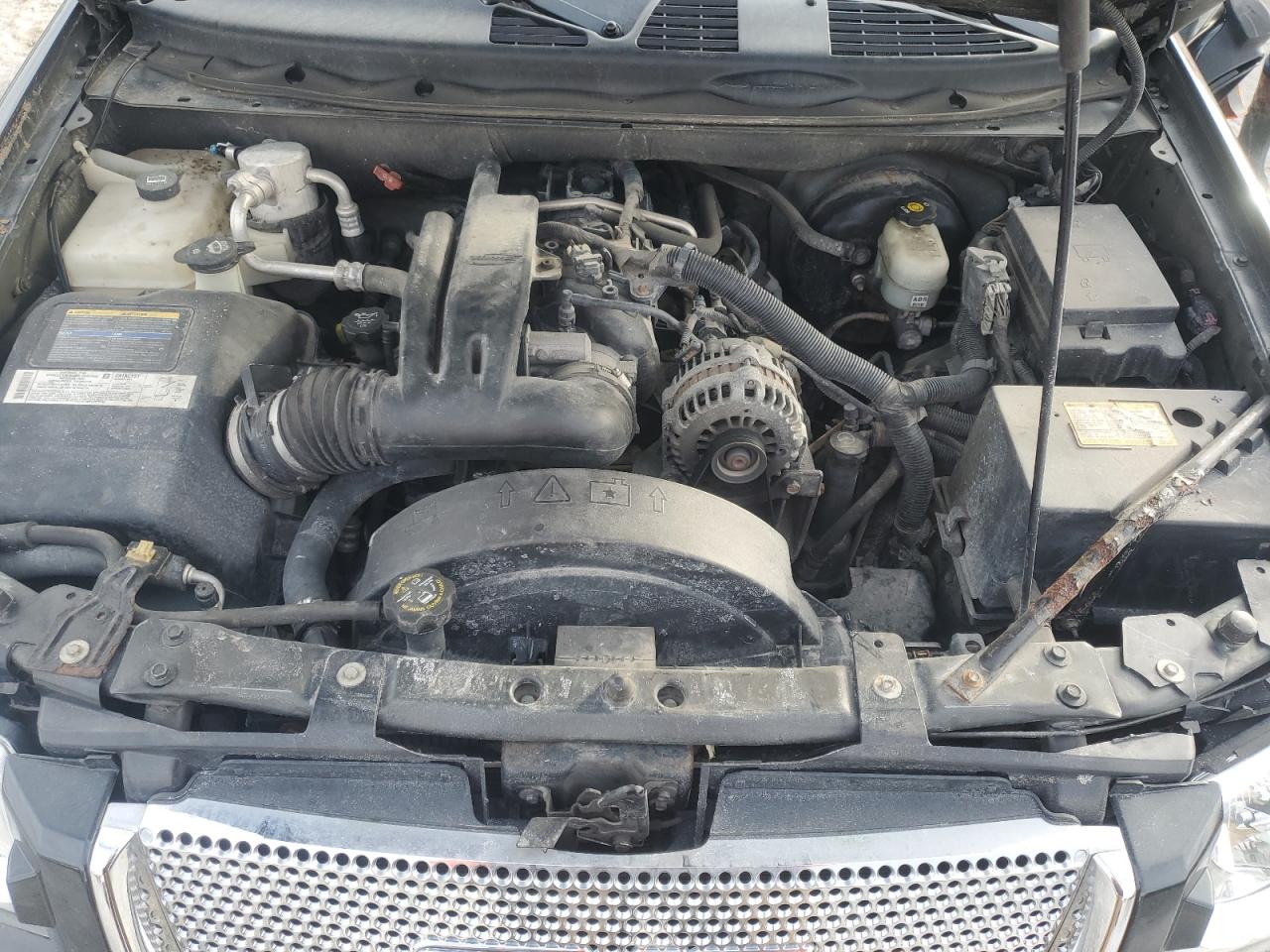 2005 GMC Envoy VIN 1GKET63M652353972 Copart auction photo, rollover damage thumbnail 11