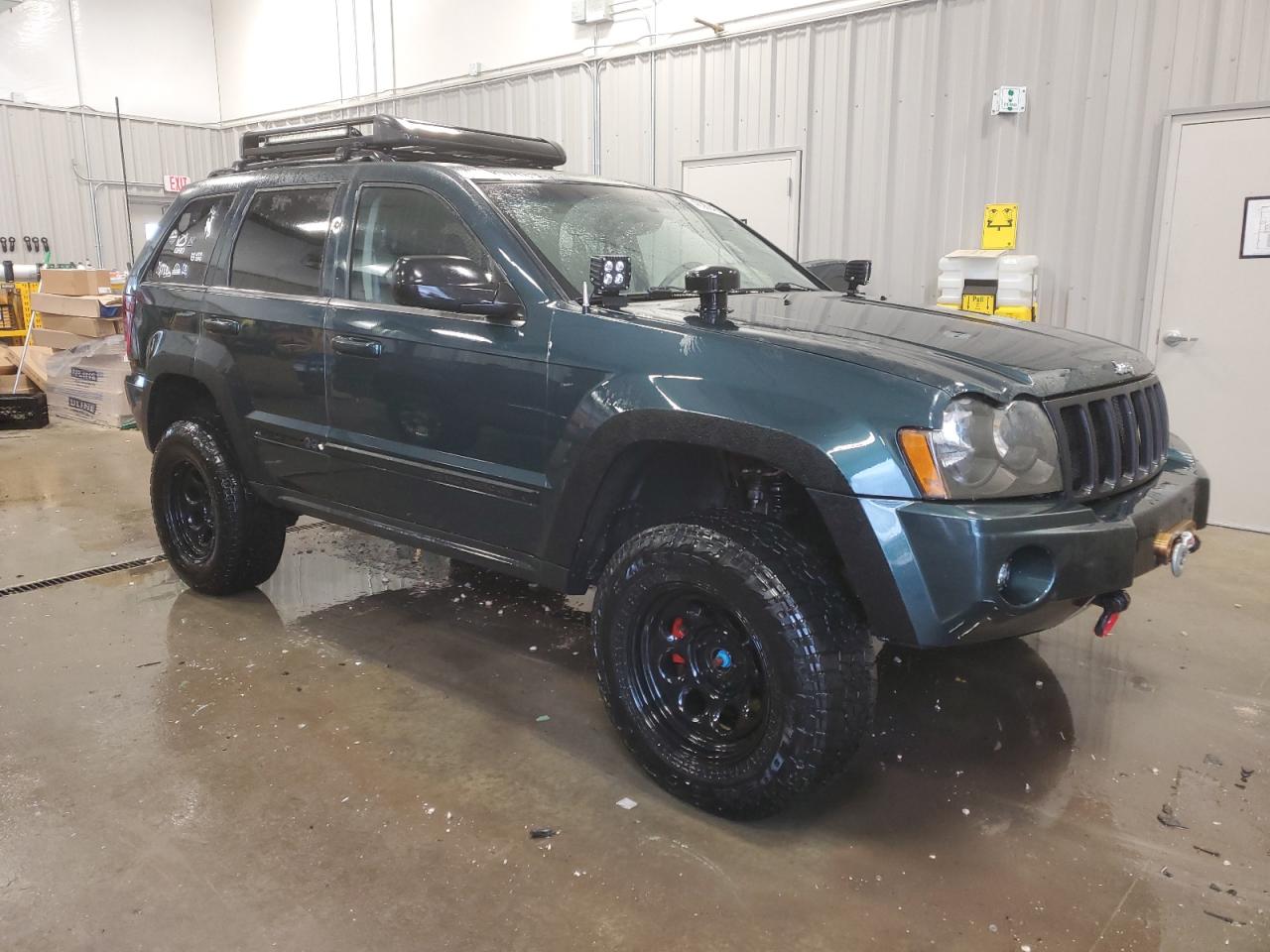 2005 Jeep Grand Cherokee VIN 1J4HR58NX5C522933 Copart auction photo, undercarriage damage thumbnail 4
