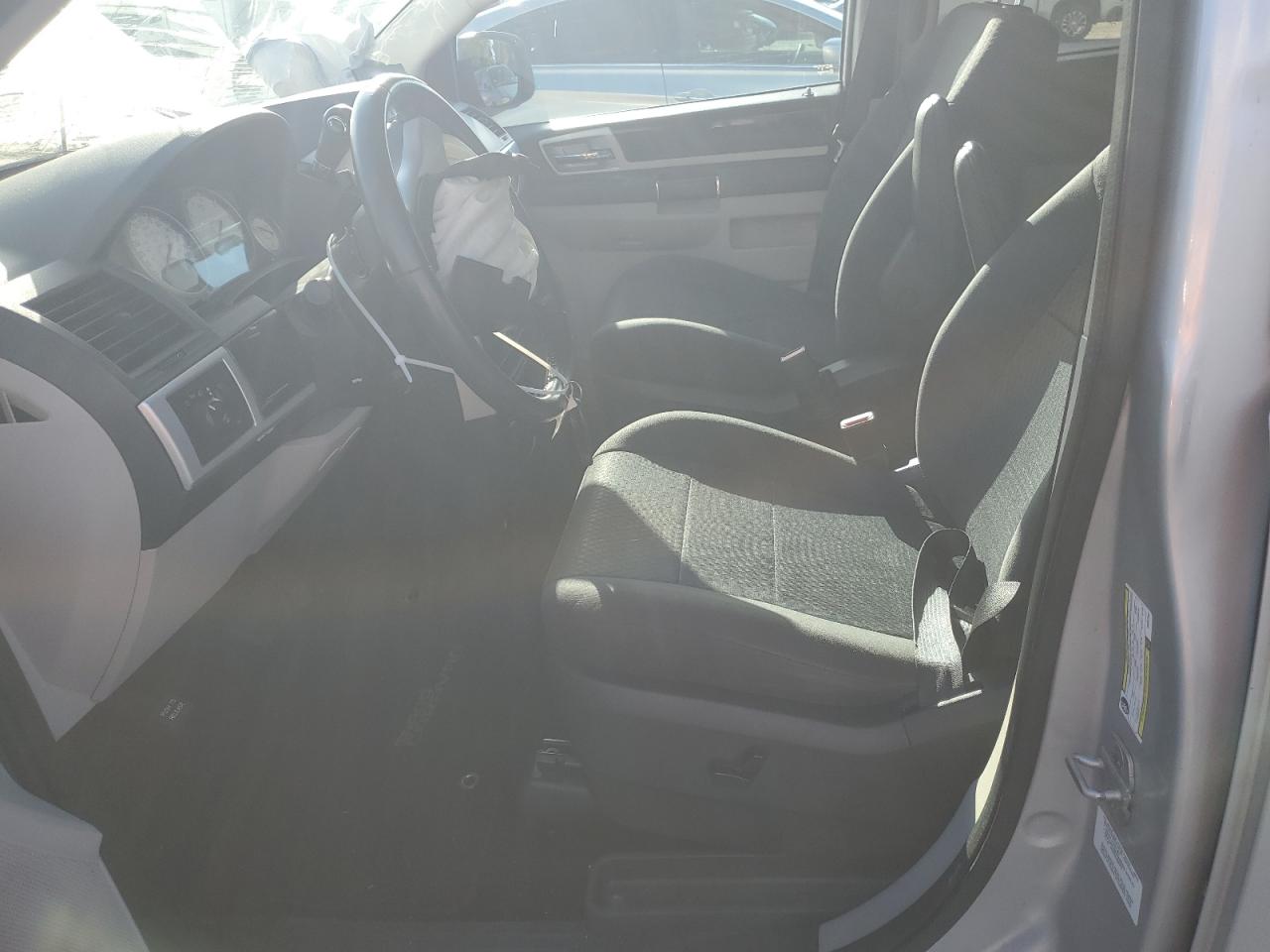 2010 Dodge Caravan VIN 2D4RN5D19AR497391 Copart auction photo, front end / minor dent/scratches damage thumbnail 7