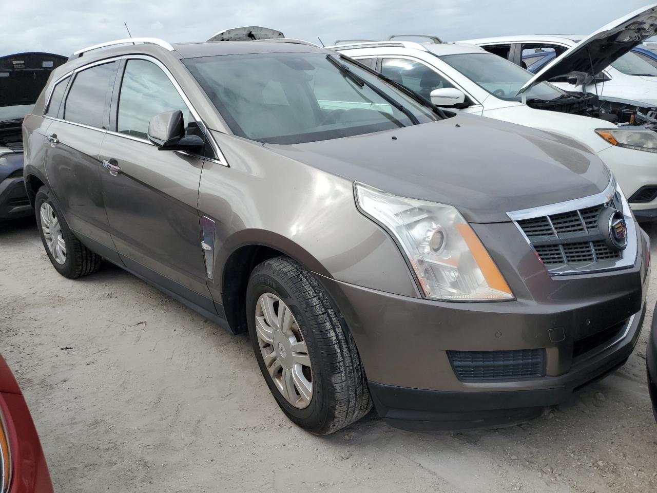 2012 Cadillac SRX VIN 3GYFNAE3XCS598707 Copart auction photo, water/flood damage thumbnail 4