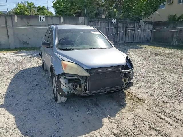 2009 Honda CR-V VIN 3CZRE38319G709550 Copart auction photo, rear end / front end damage thumbnail 11