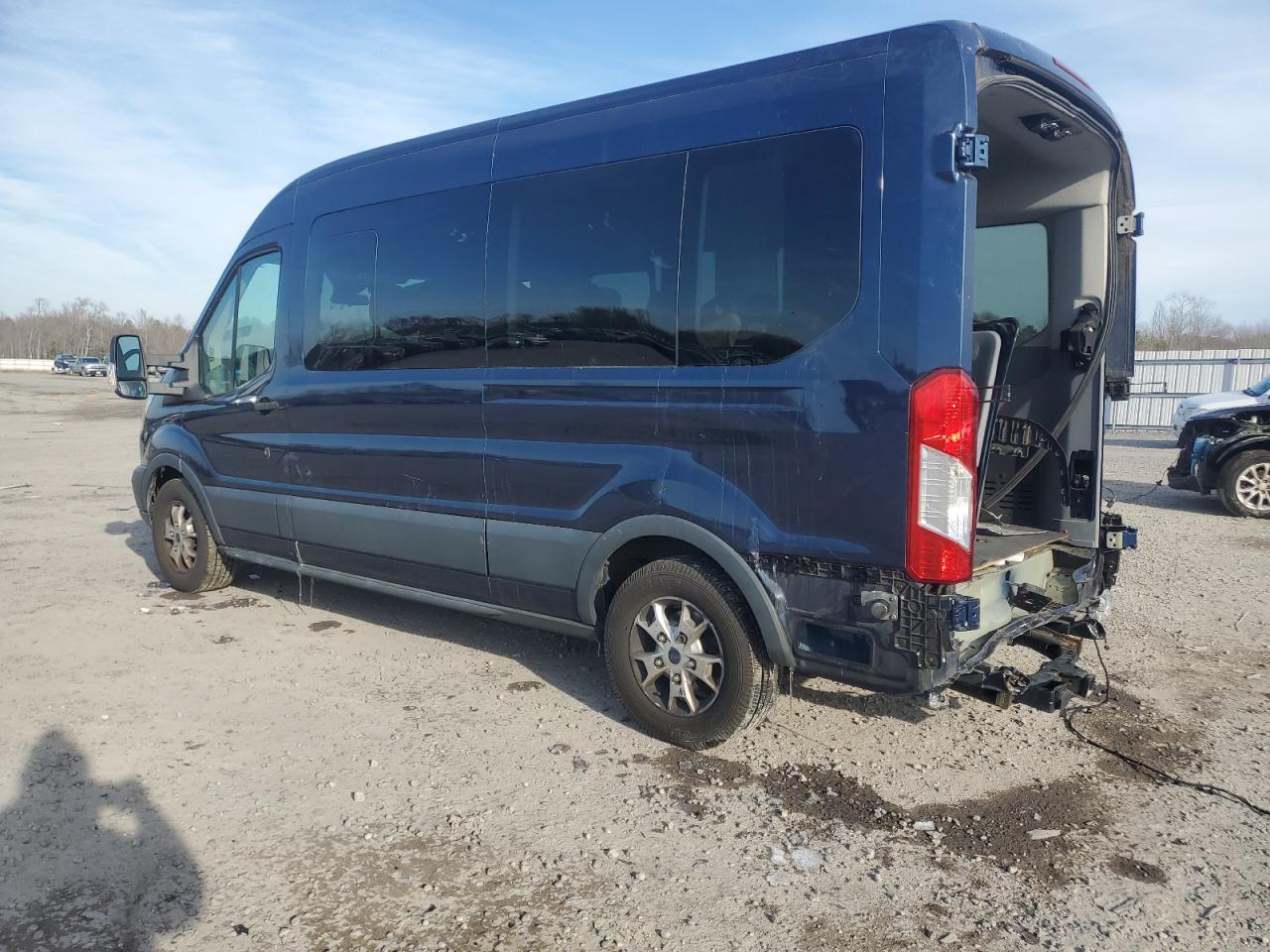 2015 Ford Transit VIN 1FBAX2CG6FKA57857 Copart auction photo, rear end / minor dent/scratches damage thumbnail 2