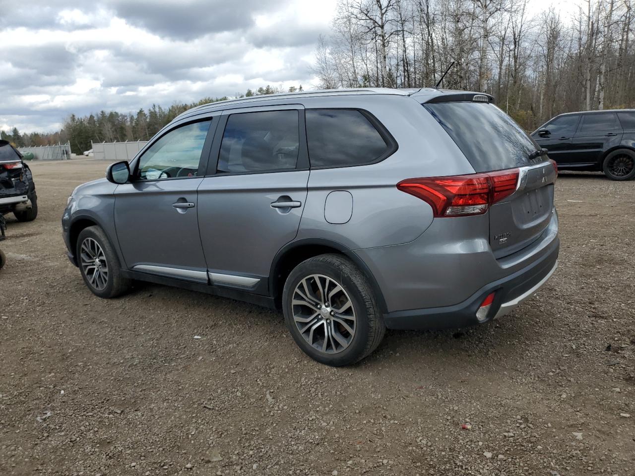 2016 Mitsubishi Outlander VIN JA4AZ2A38GZ600490 Copart auction photo, side / minor dent/scratches damage thumbnail 2