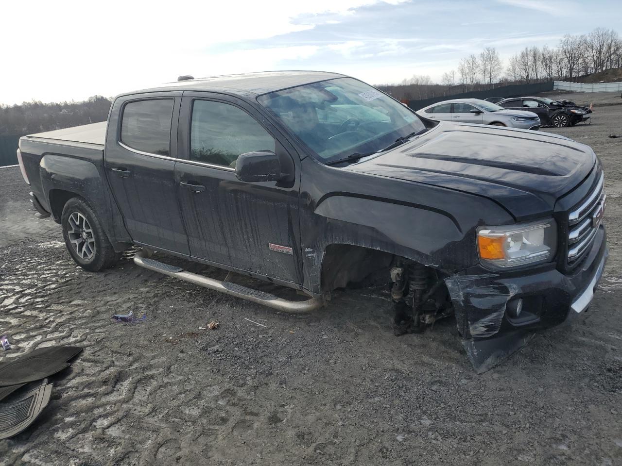 2015 GMC Canyon VIN 1GTG6BE34F1165547 Copart auction photo, undercarriage damage thumbnail 4