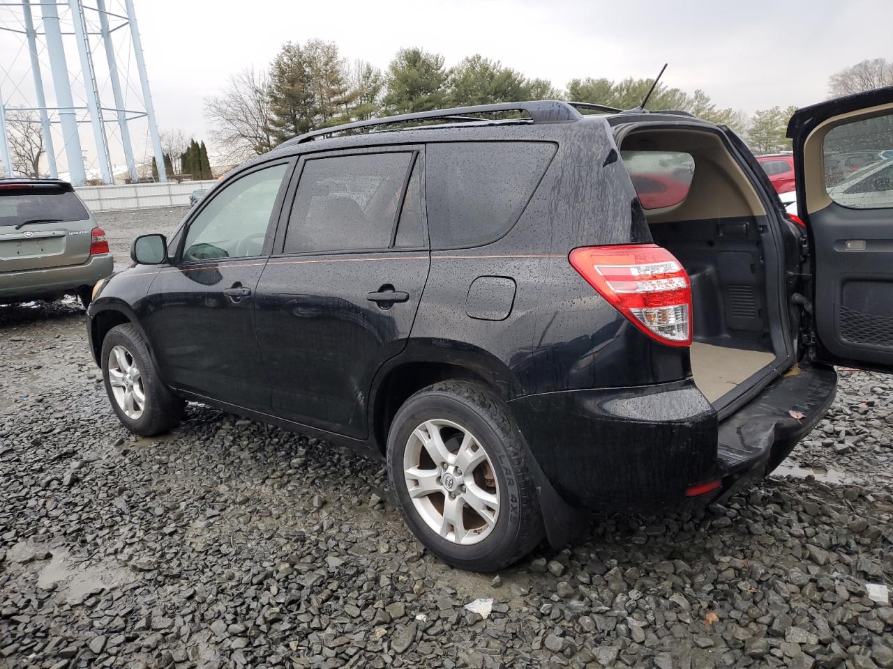 2010 Toyota RAV 4 VIN JTMBK4DV6AD011403 Copart auction photo, front end / rear end damage thumbnail 2