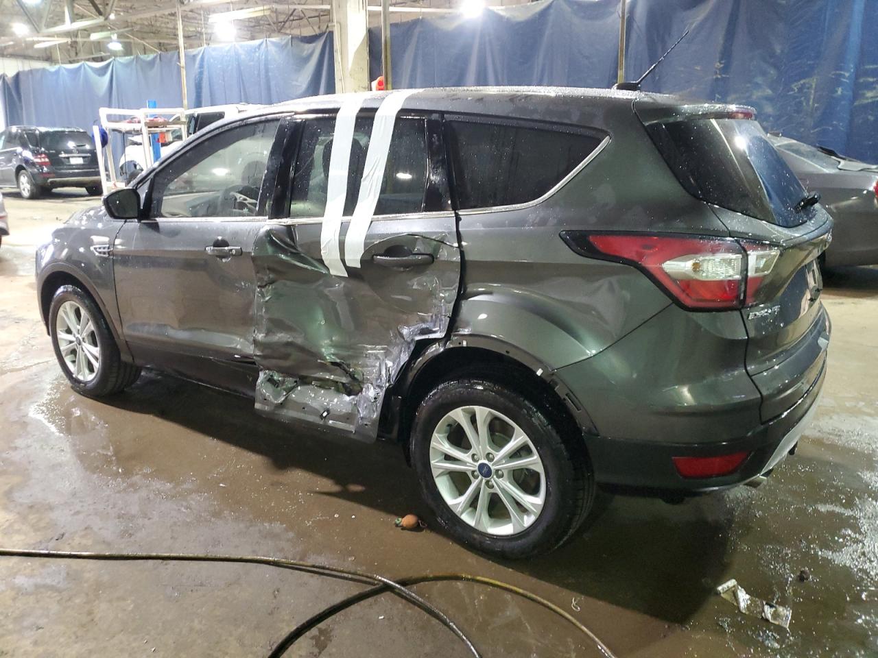 2017 Ford Escape VIN 1FMCU0GD1HUE94198 Copart auction photo, side damage thumbnail 2