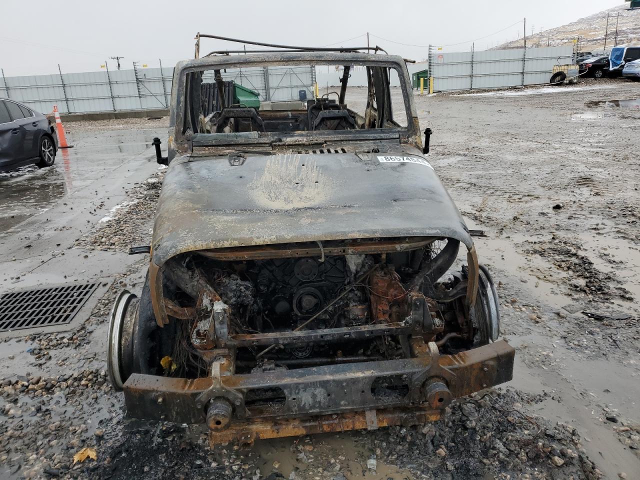 2010 Jeep Wrangler VIN 1J4BA6H12AL116672 Copart auction photo, burn damage thumbnail 5