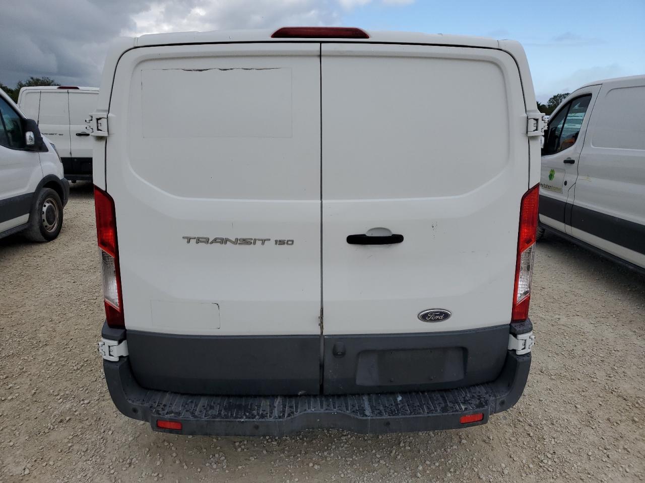2017 Ford Transit VIN 1FTYE1YM5HKB37842 Copart auction photo, water/flood damage thumbnail 6