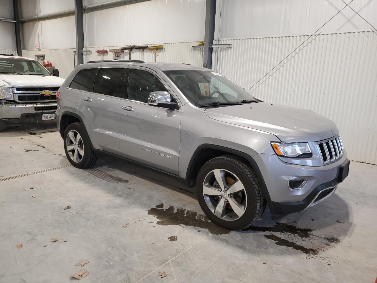 2015 Jeep Grand Cherokee VIN 1C4RJFBG4FC712729 Copart auction photo, front end damage thumbnail 4
