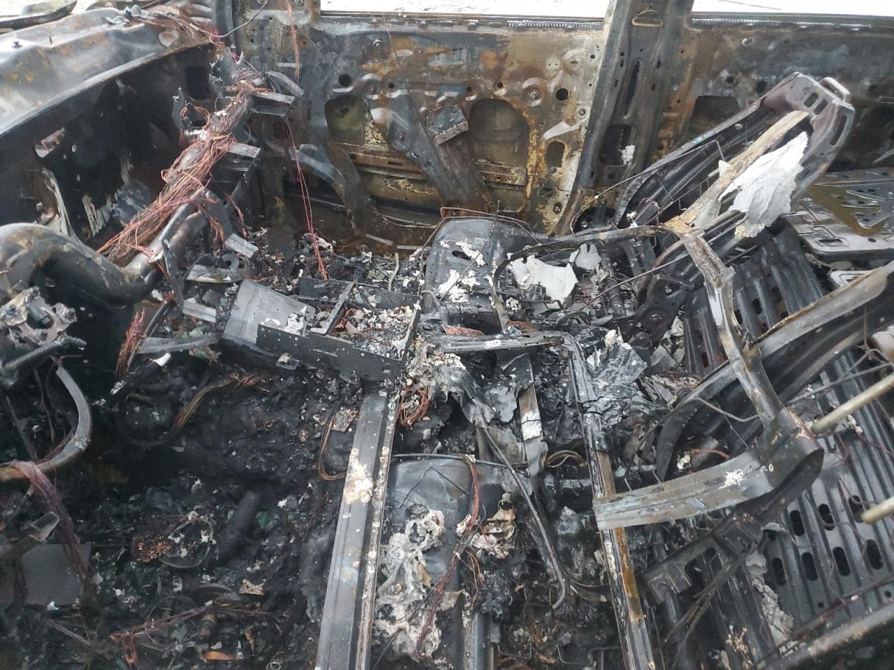 2019 Chevrolet Tahoe VIN 1GNSKCKC5KR276725 Copart auction photo, burn damage thumbnail 7