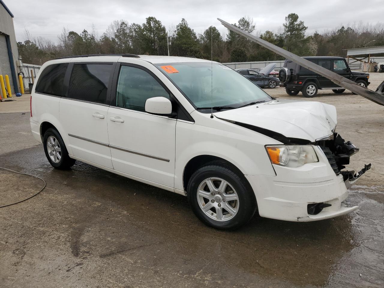 2010 Chrysler Town & Country VIN 2A4RR5DXXAR329758 Copart auction photo, front end / rear end damage thumbnail 4