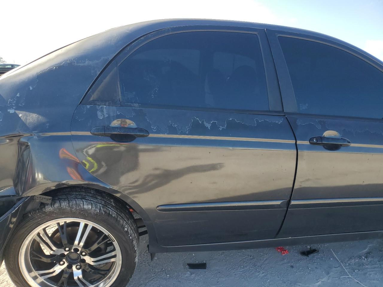 2004 KIA Spectra VIN KNAFE121745055316 Copart auction photo, all over damage thumbnail 10