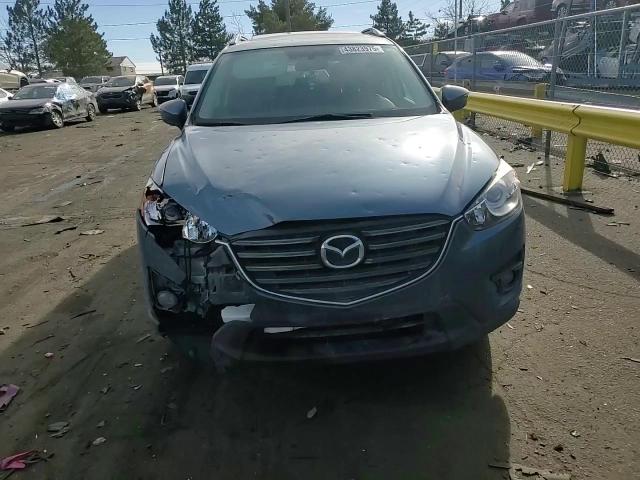 2016 Mazda CX-5 VIN JM3KE4DYXG0918566 Copart auction photo, front end damage thumbnail 11