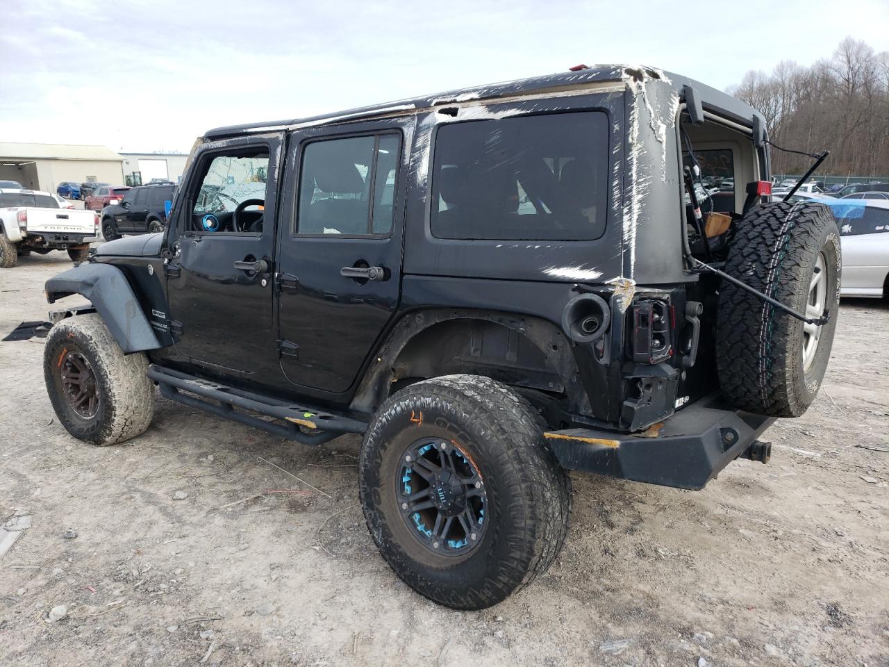 2016 Jeep Wrangler VIN 1C4BJWDG4GL144417 Copart auction photo, rollover / side damage thumbnail 2
