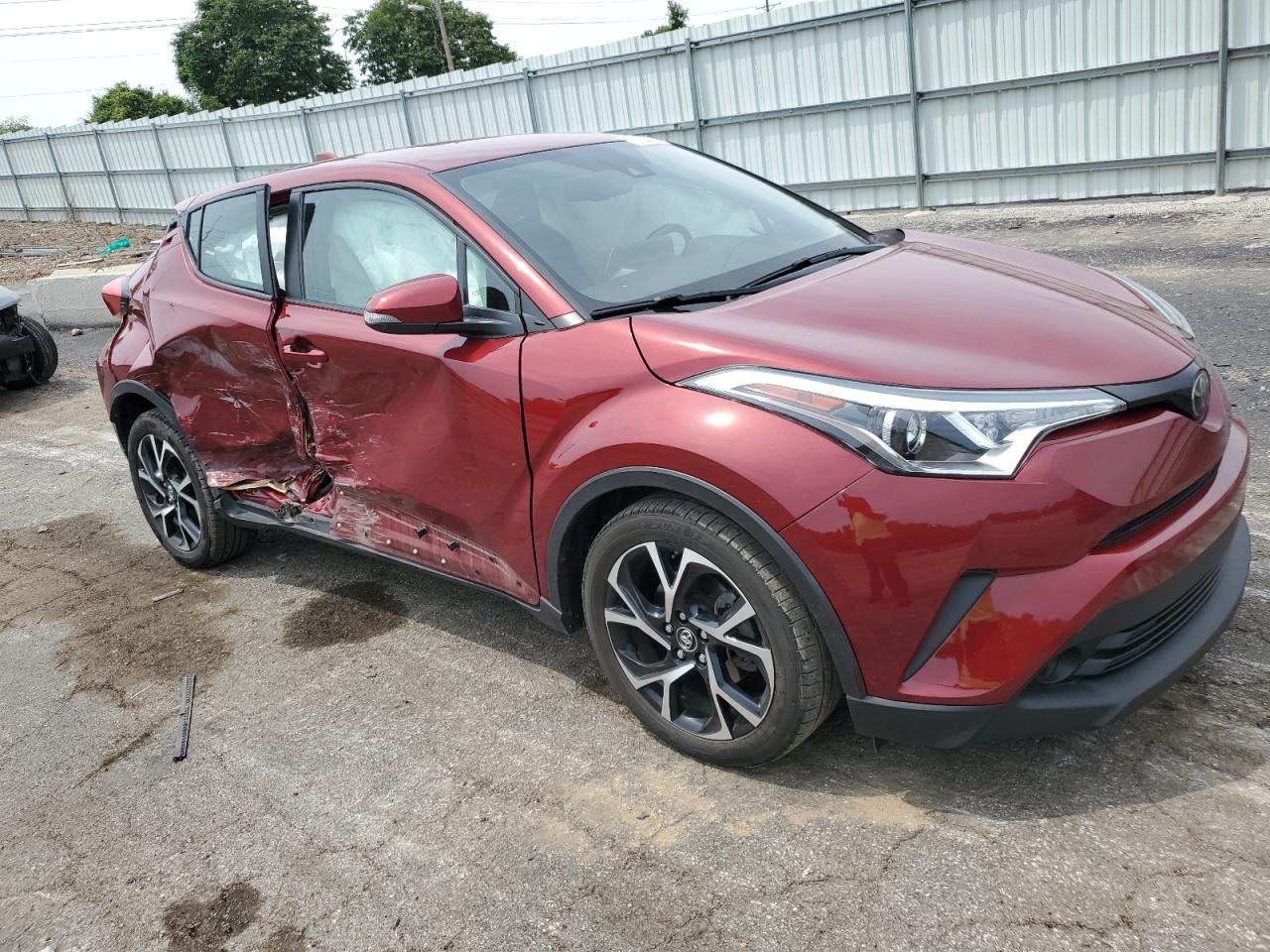2019 Toyota C-HR VIN NMTKHMBX2KR084226 Copart auction photo, side damage thumbnail 4