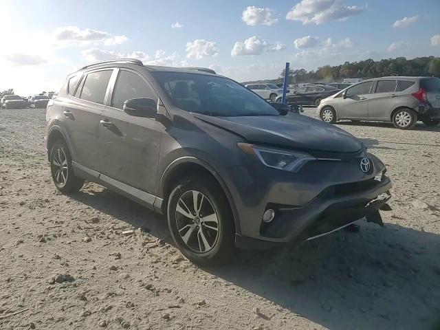 2016 Toyota RAV 4 VIN 2T3WFREV0GW291056 Copart auction photo, front end / side damage thumbnail 12