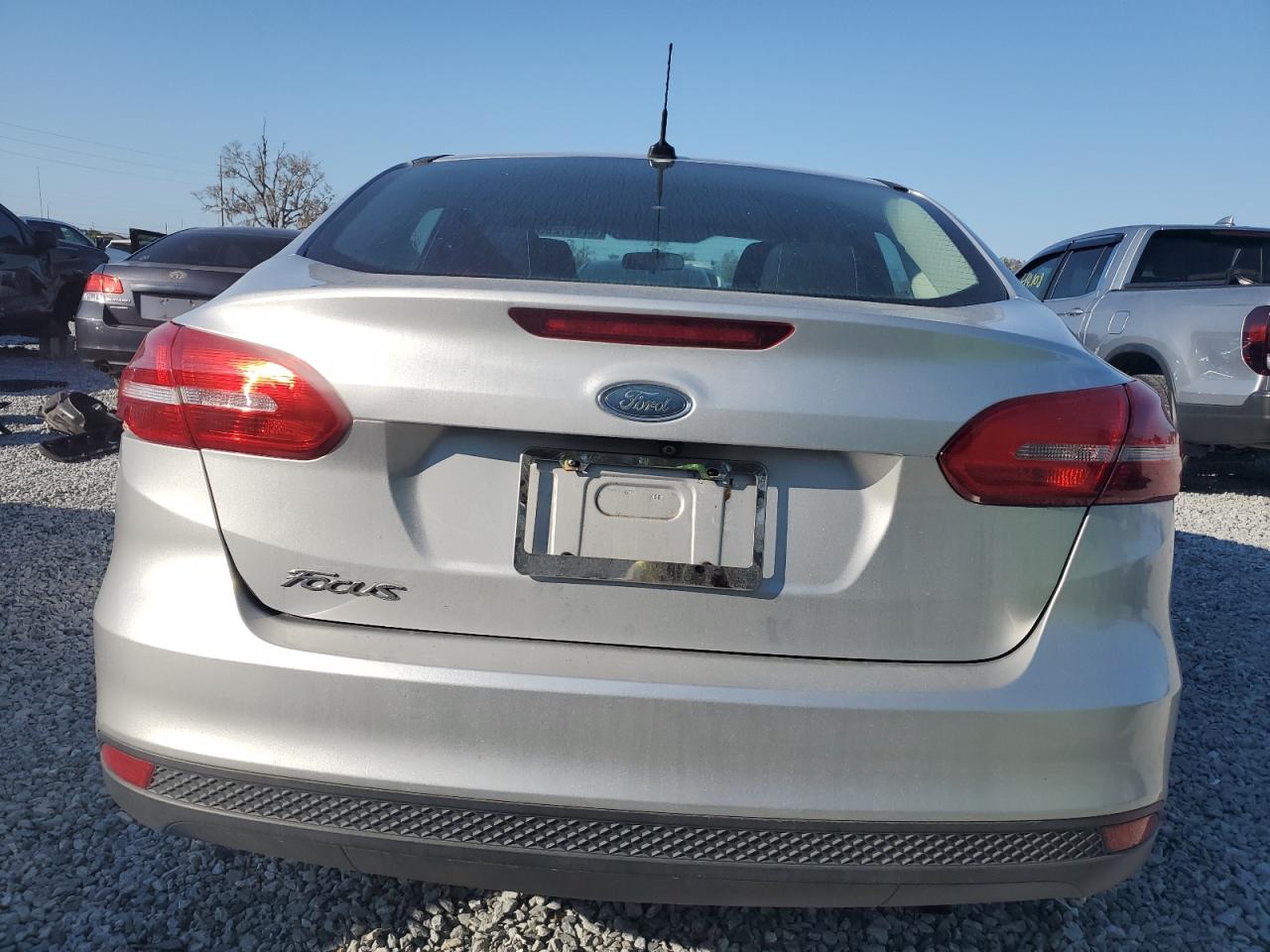 2017 Ford Focus VIN 1FADP3E29HL312293 Copart auction photo, side damage thumbnail 6
