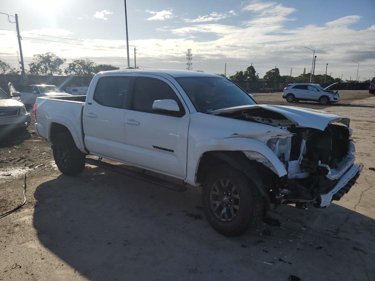 2022 Toyota Tacoma VIN 3TMAZ5CN3NM188418 Copart auction photo, front end damage thumbnail 4