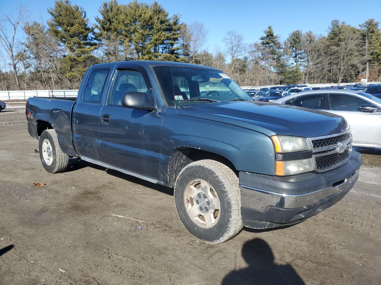 2006 Chevrolet Silverado VIN 1GCEK19V76Z215657 Copart auction photo, side / minor dent/scratches damage thumbnail 4