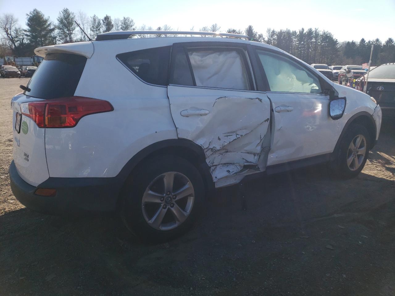 2015 Toyota RAV 4 VIN 2T3RFREV3FW345283 Copart auction photo, rollover / side damage thumbnail 3