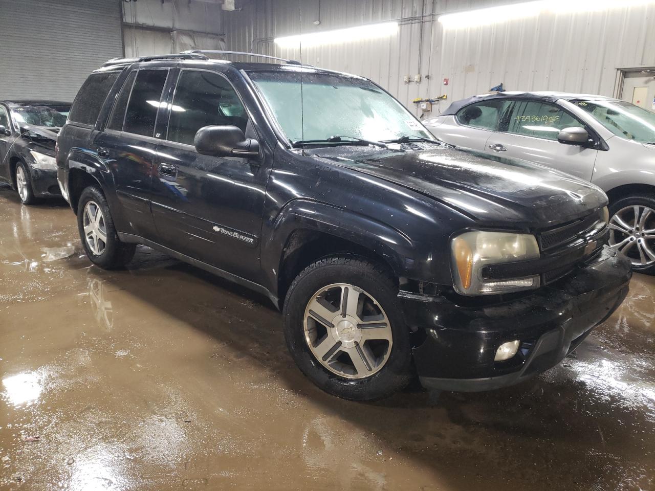 2004 Chevrolet TrailBlazer VIN 1GNDT13S042285148 Copart auction photo, side damage thumbnail 4