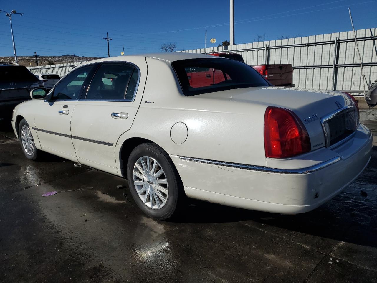 2003 Lincoln Town Car VIN 1LNHM81W73Y669991 Copart auction photo, front end / rear end damage thumbnail 2
