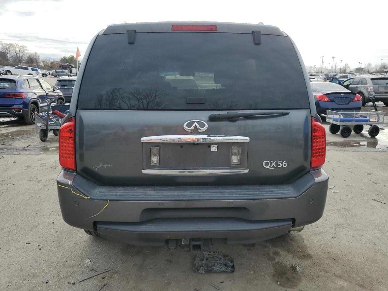 2010 Infiniti QX56 VIN 5N3ZA0NE2AN909809 Copart auction photo, side / rear end damage thumbnail 6