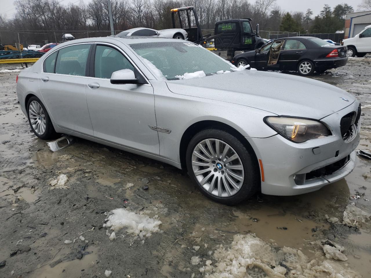 2011 BMW 7er VIN WBAKC8C54BC431767 Copart auction photo, front end damage thumbnail 4