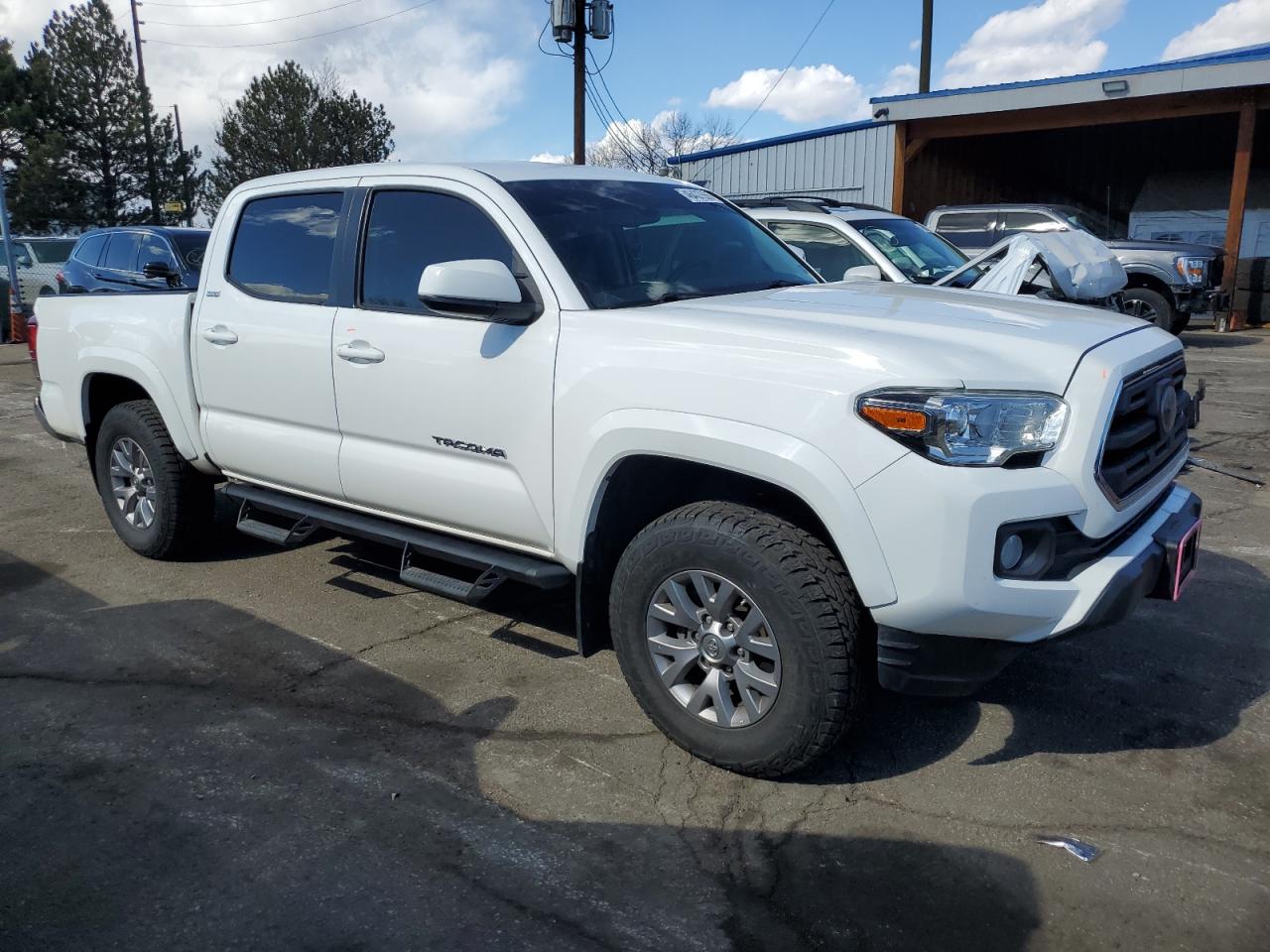 2019 Toyota Tacoma VIN 5TFAZ5CN1KX086878 Copart auction photo, rear end damage thumbnail 4