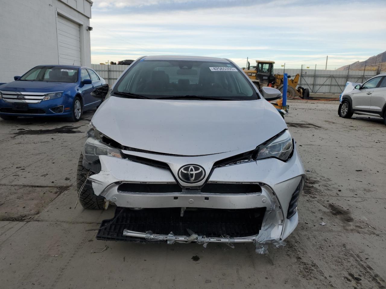 2017 Toyota Corolla VIN 2T1BURHE5HC799700 Copart auction photo, front end / side damage thumbnail 5
