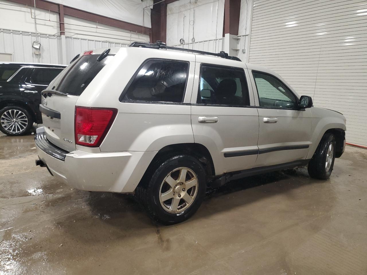 2009 Jeep Grand Cherokee VIN 1J8GR48K09C534704 Copart auction photo, side / front end damage thumbnail 3