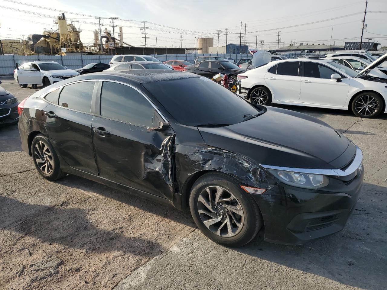 2016 Honda Civic VIN 2HGFC2F77GH517983 Copart auction photo, all over damage thumbnail 4