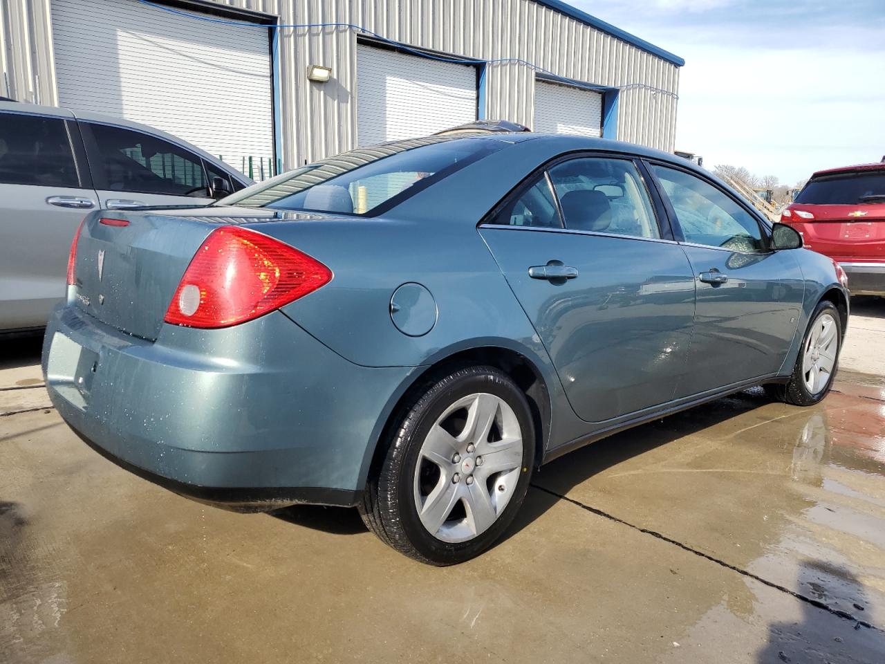 2009 Pontiac G6 VIN 1G2ZG57B494136617 Copart auction photo, undercarriage / minor dent/scratches damage thumbnail 3