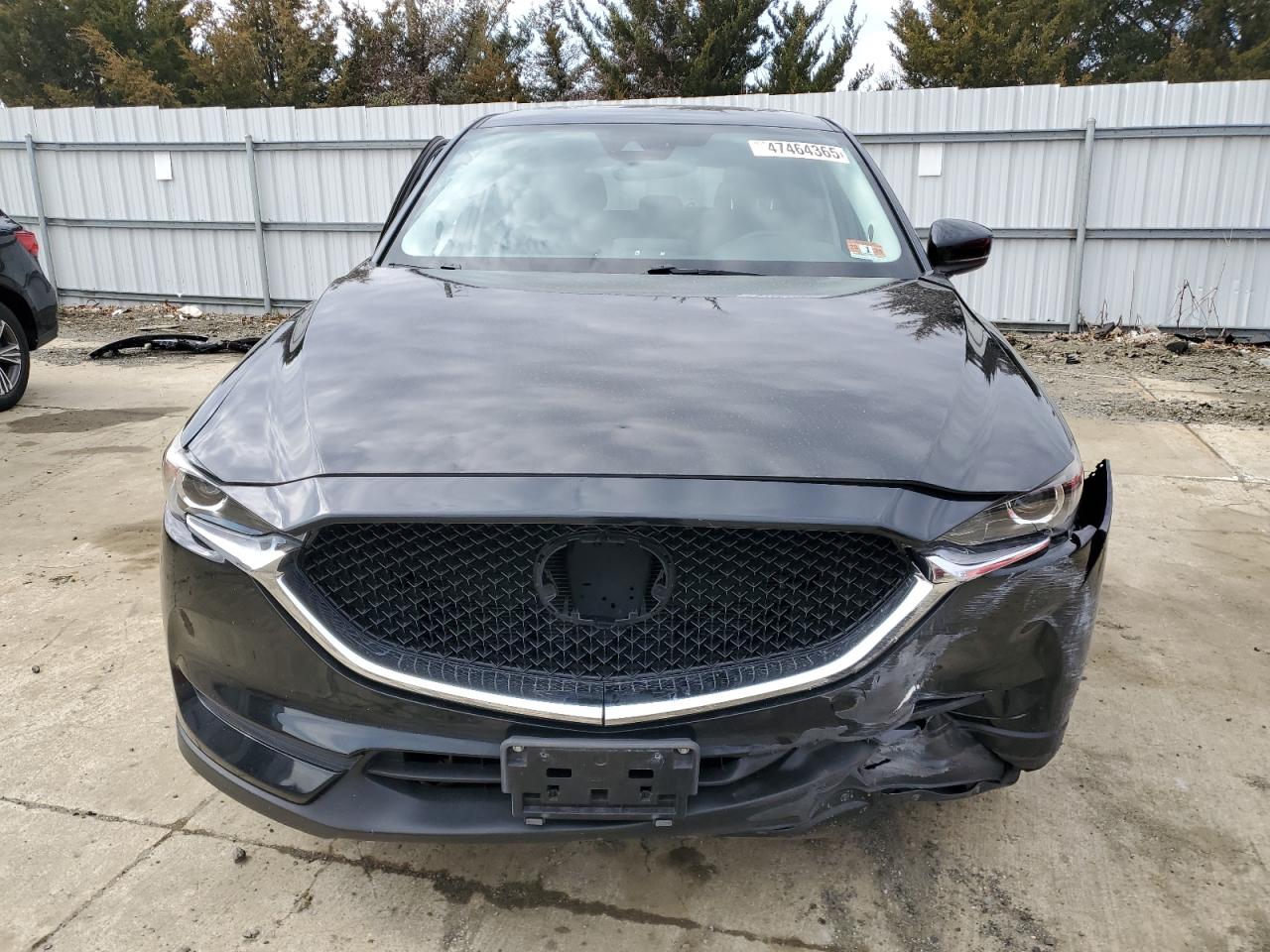 2017 Mazda CX-5 VIN JM3KFACLXH0195725 Copart auction photo, side / front end damage thumbnail 5