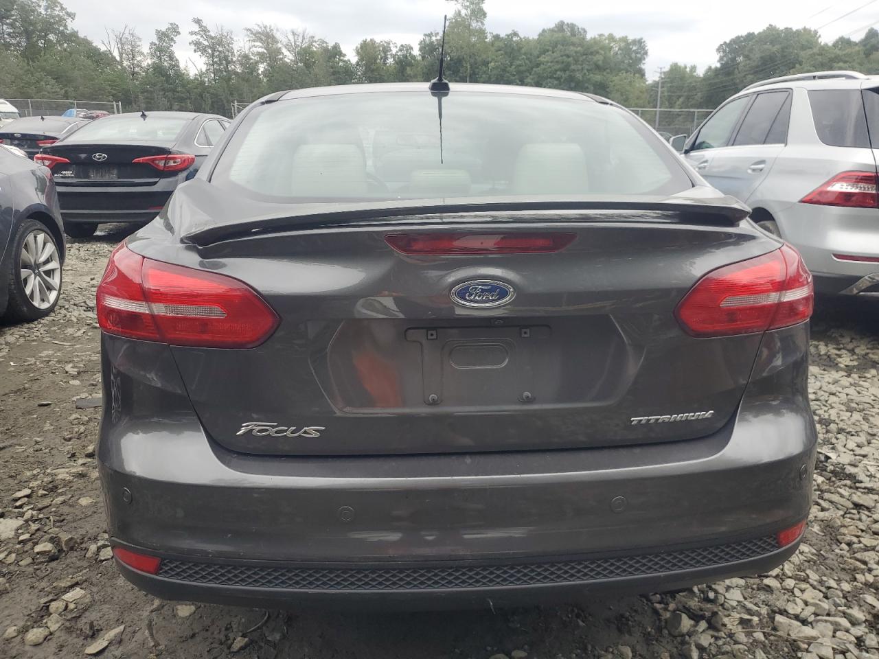 2018 Ford Focus VIN 1FADP3J20JL281110 Copart auction photo, all over / undercarriage damage thumbnail 6