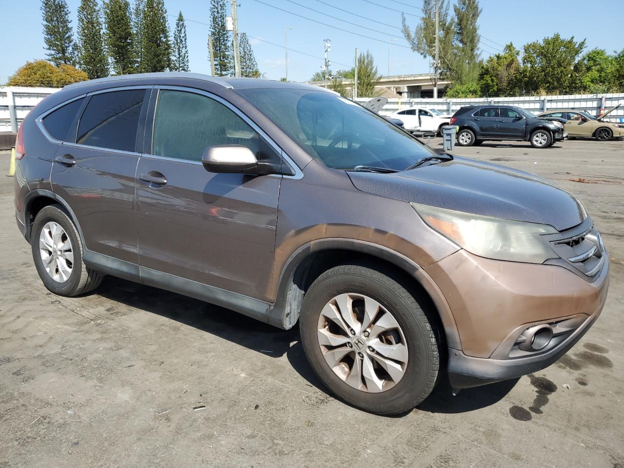 2013 Honda CR-V VIN 5J6RM3H79DL023953 Copart auction photo, vandalism / burn - interior damage thumbnail 4