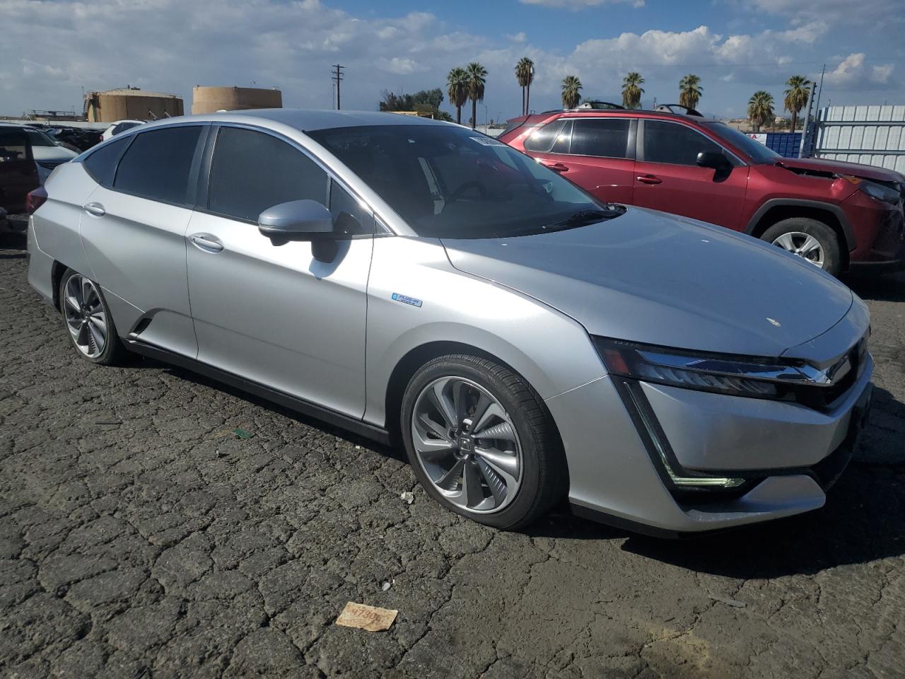 2018 Honda Clarity VIN JHMZC5F3XJC024303 Copart auction photo, side / front end damage thumbnail 4