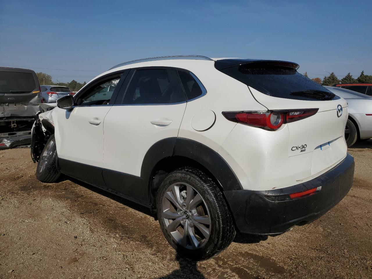 2024 Mazda CX-30 VIN 3MVDMBCM9RM672115 Copart auction photo, side / front end damage thumbnail 2