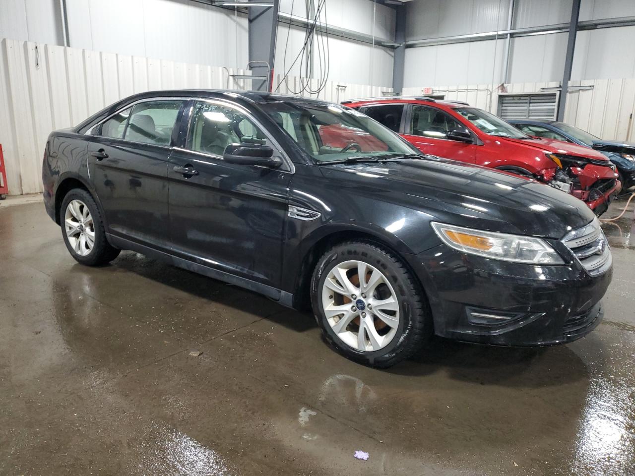 2011 Ford Taurus VIN 1FAHP2EW5BG139144 Copart auction photo, front end damage thumbnail 4