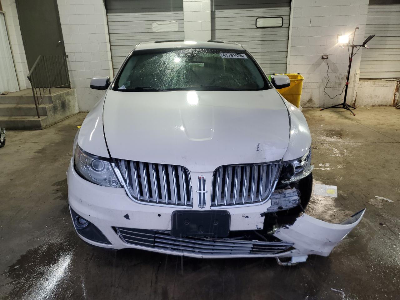 2009 Lincoln MKS VIN 1LNHM94R89G602181 Copart auction photo, front end damage thumbnail 5